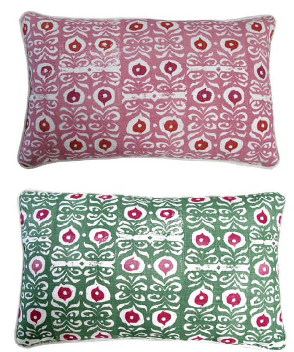 Iznik print patterned linen lumbar cushions in raspberry pinks or grass green and red.