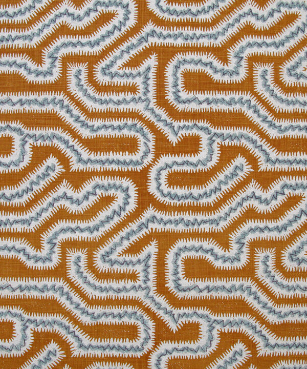 Burnt orange and blue linen in maze design.