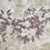 Stone coloured cushions fabric with sepia accents depicting a country house garden.