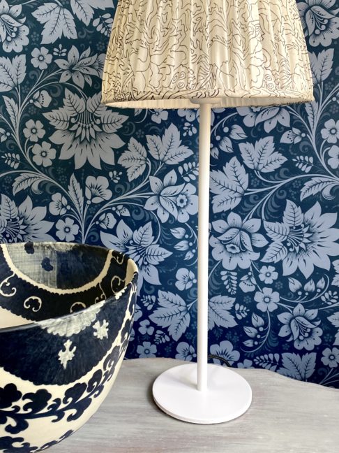 Folk art design wallpaper in Milana midnight blue available through Telescope Style.