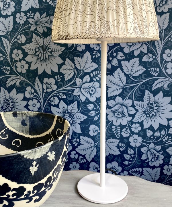 Folk art design wallpaper in Milana midnight blue available through Telescope Style.