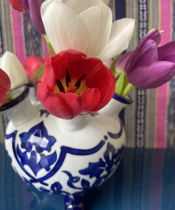 Detail of colourful tulips in a Dutch, Delft tulip vase!