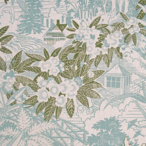 A soft blue and sage green cushion fabric depicting a rural country house garden hand-printed on linen.