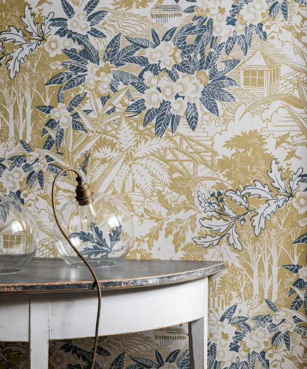 Webb's Wonder hand-printed botanical wallpaper in the chartreuse colour way in situ to give an idea of pattern and scale.