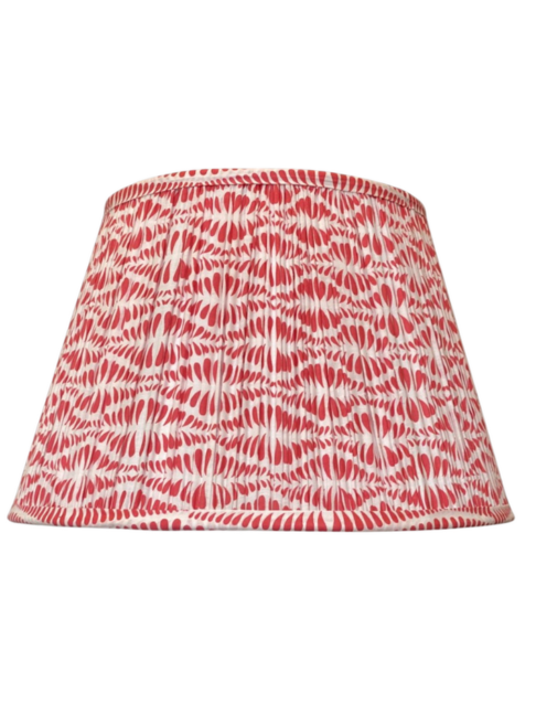 Cut out shot of a block-printed Indian cotton lampshade in a pretty cherry red colour way.