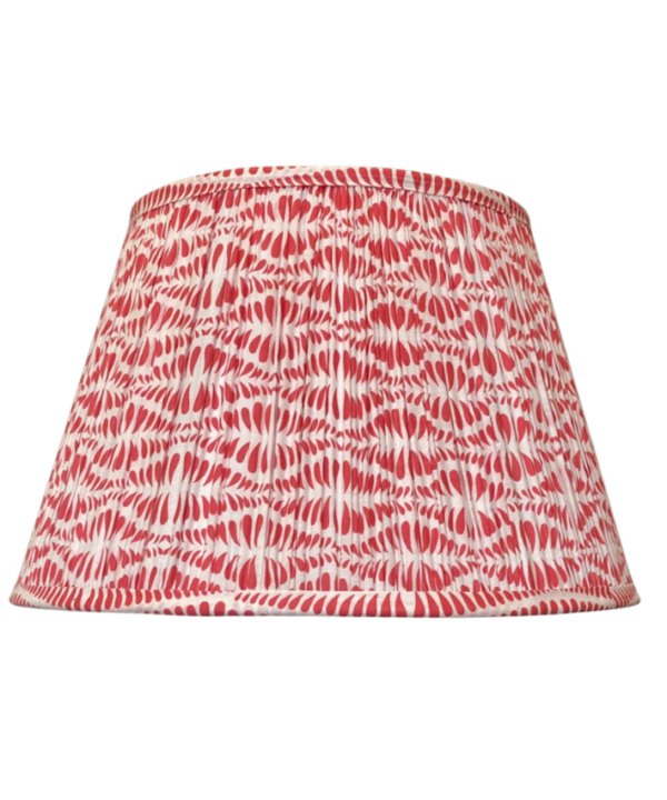 Cut out shot of a block-printed Indian cotton lampshade in a pretty cherry red colour way.