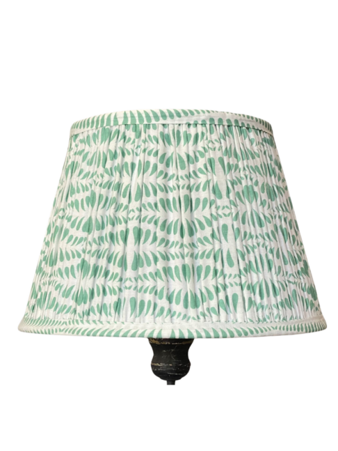 Cut out shot of a block-printed Indian cotton lampshade in a pretty mint colourway.