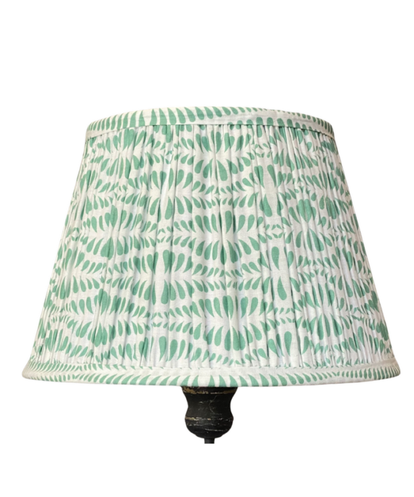 Cut out shot of a block-printed Indian cotton lampshade in a pretty mint colourway.