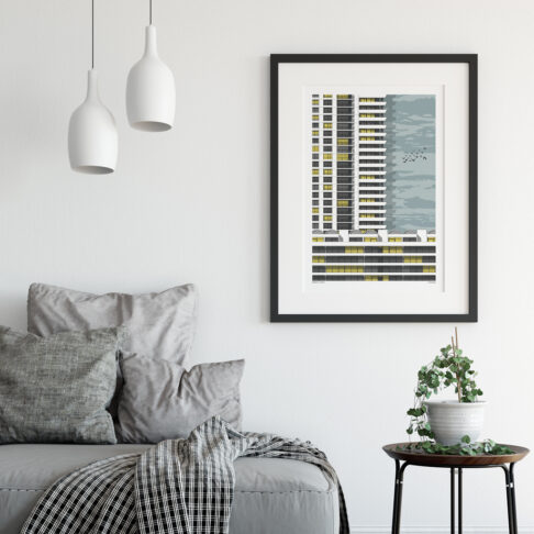 A print of a section of the Barbican in London in a sitting room scenario.