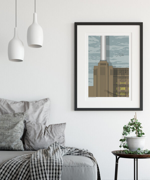 A print of a section of Battersea power station in London in a sitting room scenario.