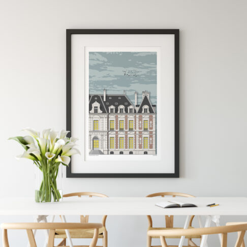 Chateau de Sceaux in France, depicted as a fine art print hung on the wall of a modern dining space.