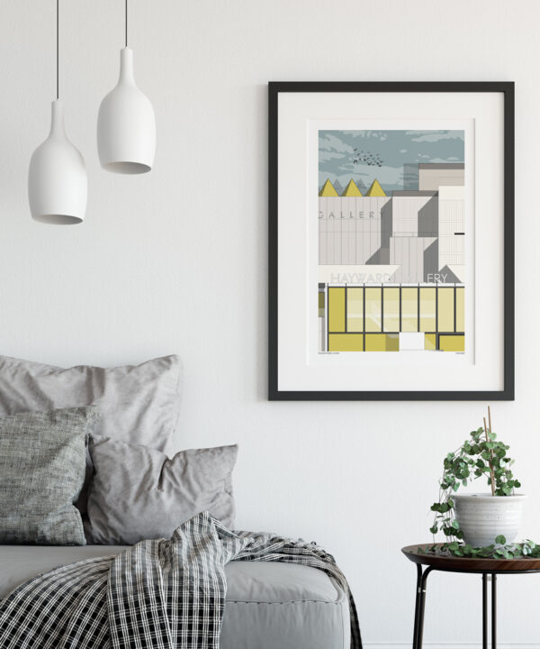 A smaller, framed version of the Hayward Gallery line drawing print, hung on the wall in a contemporary sitting room.