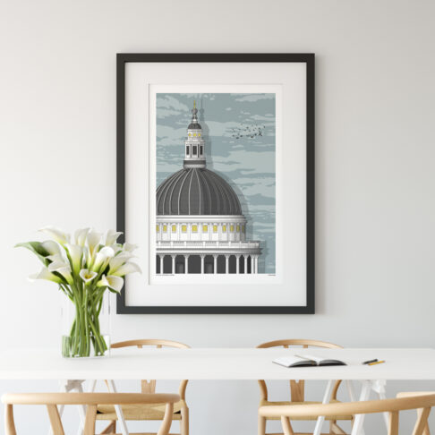 A print of a section of St. Paul's cathedral in London in a dining room scenario.