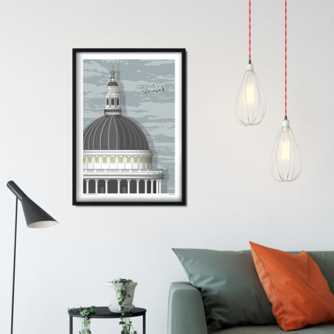 A print of a section of St. Paul's cathedral in London in a sitting room scenario.