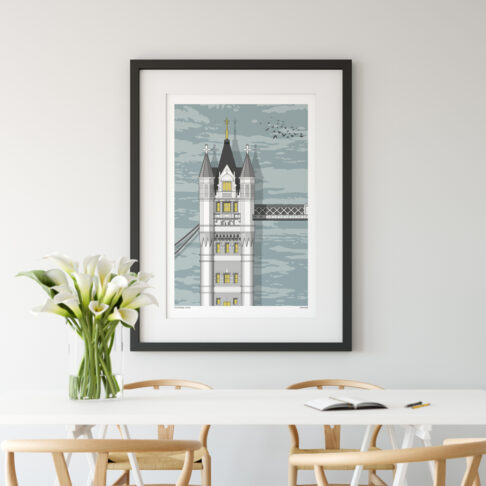 A print of a section of Tower Bridge in London in a dining room setting.