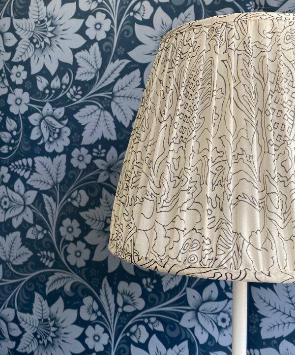 Black and white lampshades detail showing the delicate silk pattern.