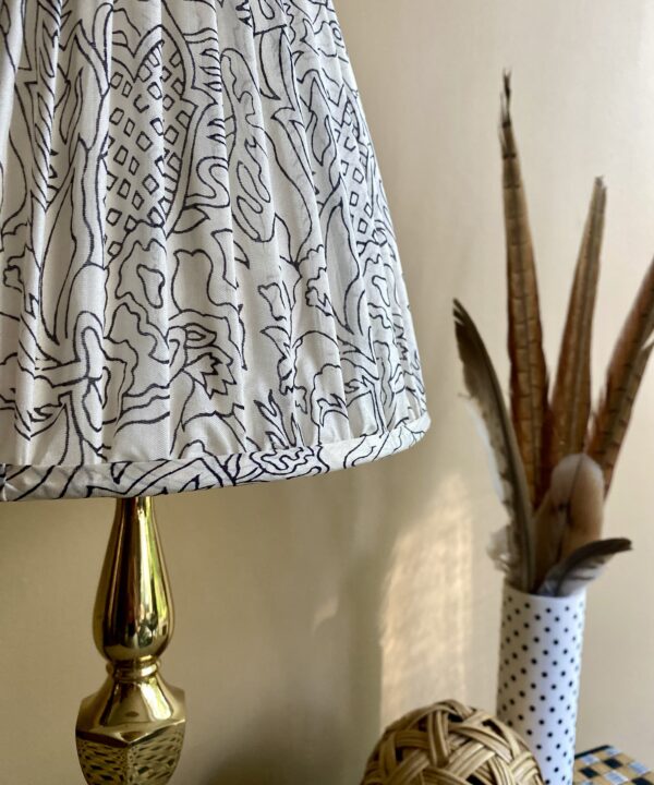 Pretty black and white gathered silk shade.