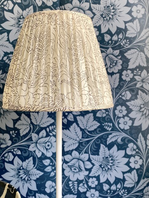 Black and white pleated silk lampshade.