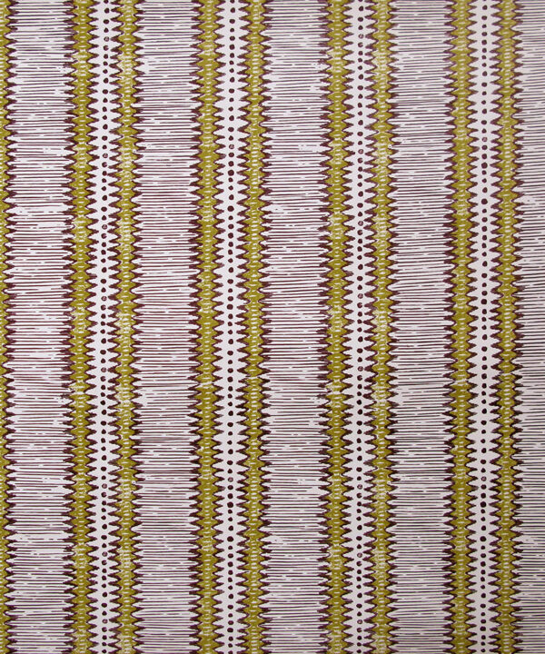 A West African-inspired, zig-zag stripe wallpaper in a straw yellow and aubergine colourway.