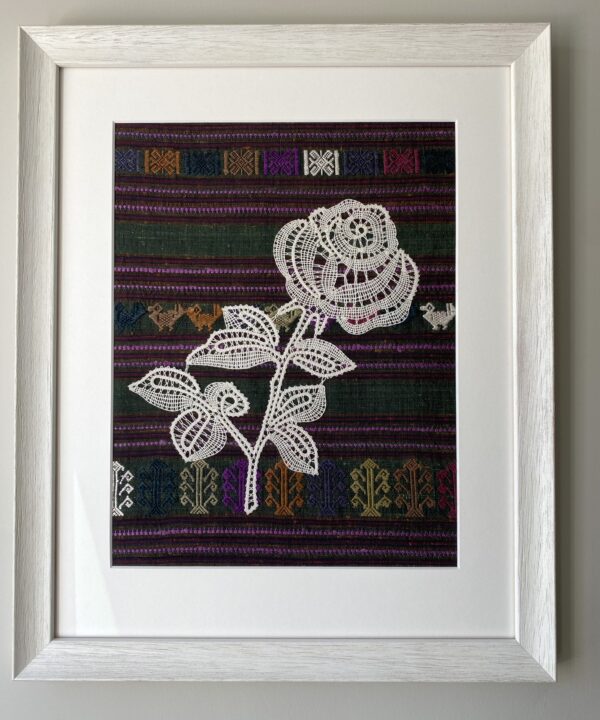 Unique framed wall art combining a hgandmade Slovenian bobbin lace rose against Thai silk.