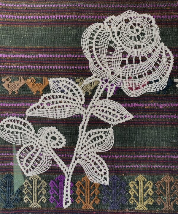 Detail of a bobbin lace rose.