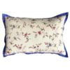 A pretty floral linen cushion with a sprig design and blue striped trim.