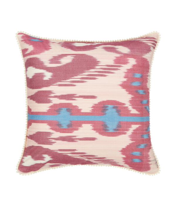 A deep pink and blue silk Ikat cushion.