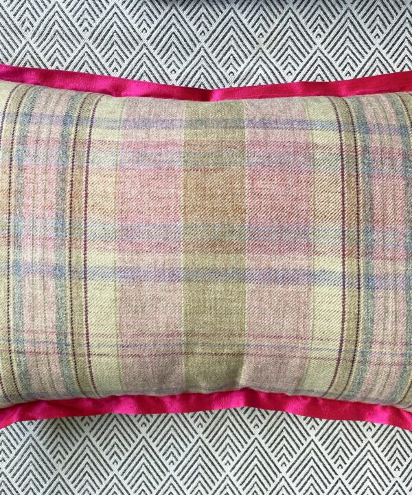 Rectangular cushion reverse in pink tartan with hot pink, silk trim.