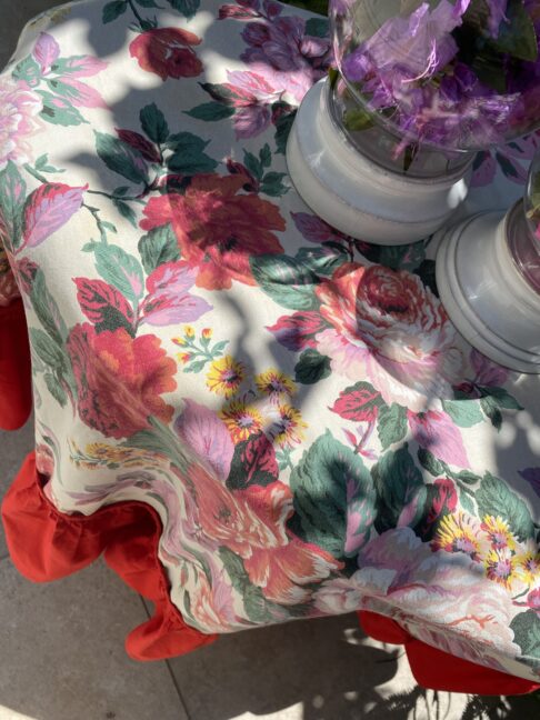 Vintage floral tablecloth close up.