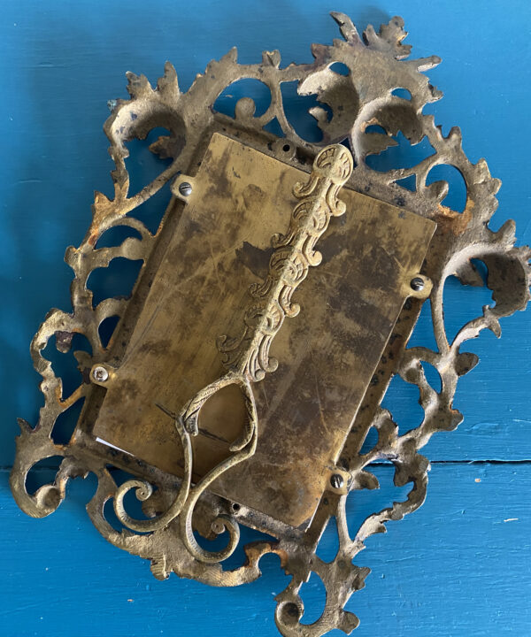 Reverse of a vintage brass photo frame sourced in a Spanish flea market.