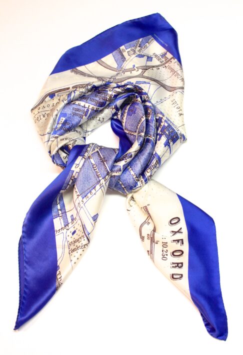 A tied, Royal blue and white silk, Oxford city print scarf.