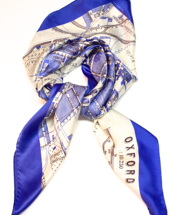 A tied, Royal blue and white silk, Oxford city print scarf.