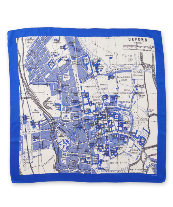 A deep blue silk scarf printed with a map of the city of Oxford, England.