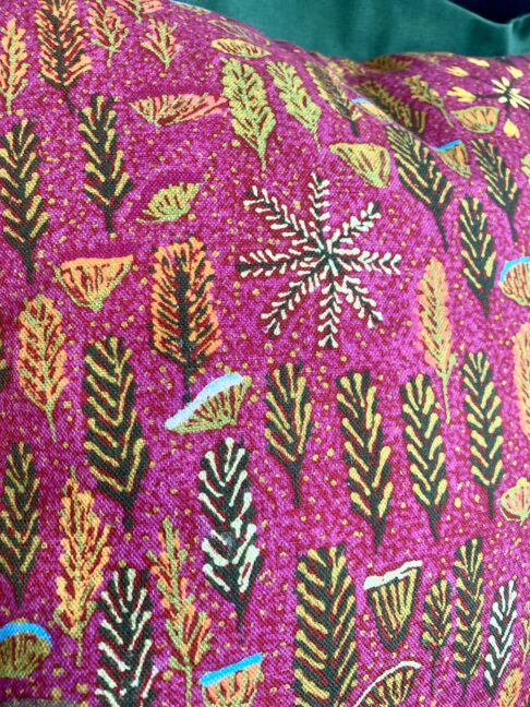 Detail of a pink botanical print on linen taken from an original indigenous Aboriginal art print. Available as a handmade cushion.