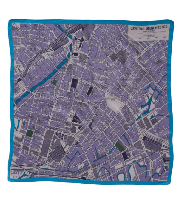 A Manchester map print on a luxury silk scarf in blues and purples.