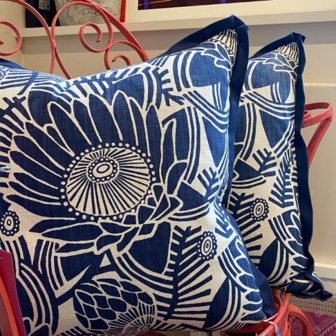 Protea print cushions in navy.