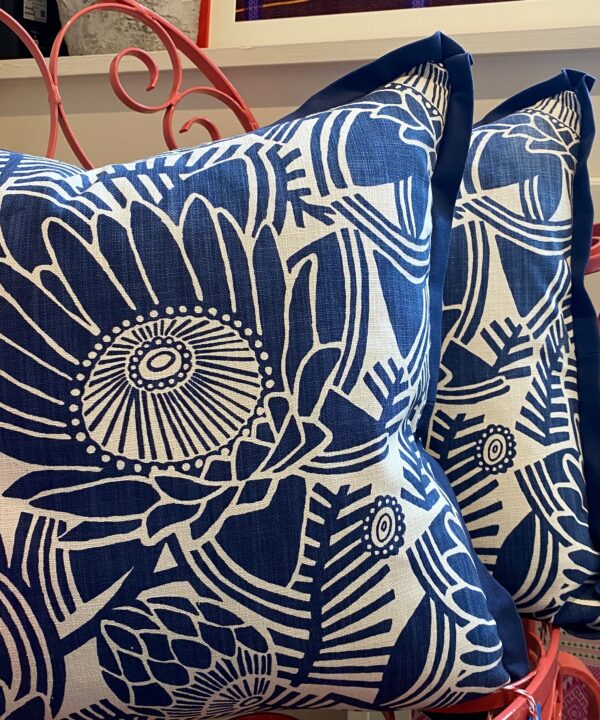 Protea print cushions in navy.