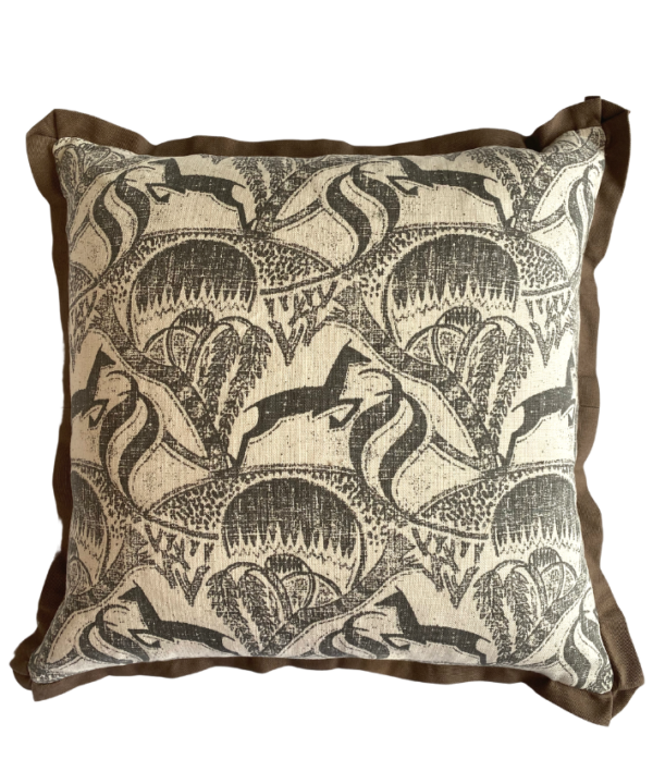 Springbok print cushion cover in monochrome with taupe trim.