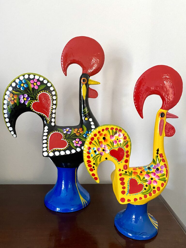 Colourful Barcelos rooster figurines, the national symbol of Portugal.