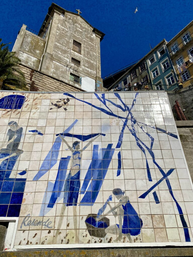 A modern interpretation of 'azulejos' tiling by the tunnel near the Luis I bridge in Porto, Portugal.