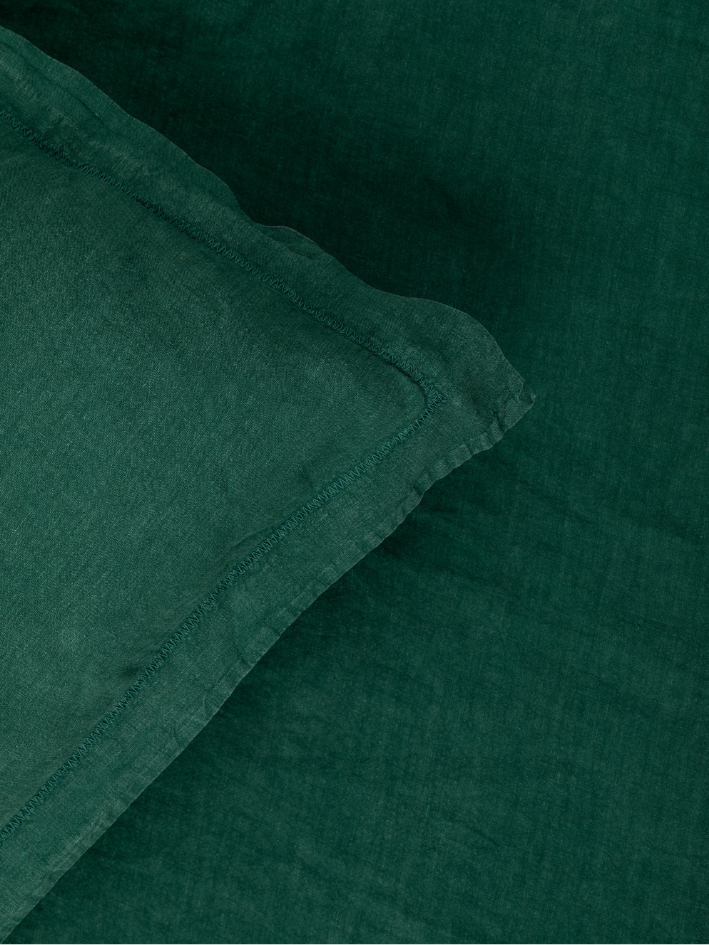 Forest green linen bedding from Heals.