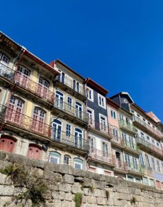 Colourful building facades along the waterfront in Porto's old town.