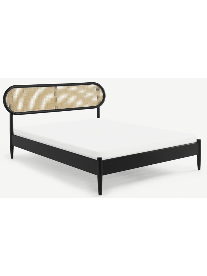 A modern cane and black stained bed from Made.com..