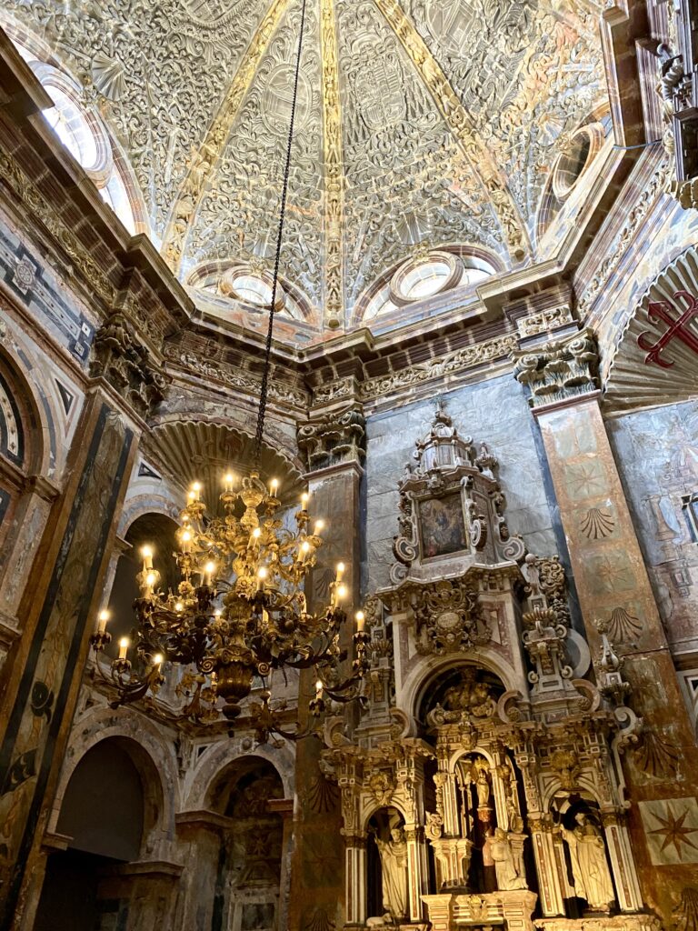 The soaring domed interior of a chapel within the cathedral in Santiago De Compostela, Galicia, Spain.