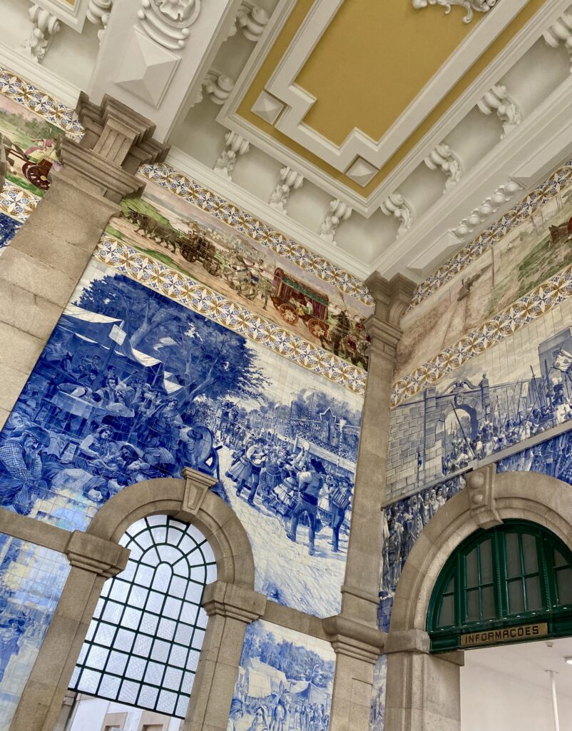 The tiled interior of São Bento railway station in Porto, Portugal.