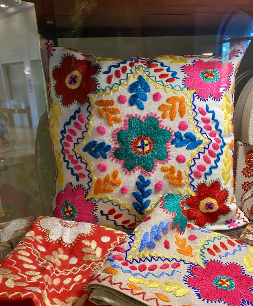 Viana Do Costelo, in northern Portugal, is known for its colourful hand embroidery, shown here on cushions covers.