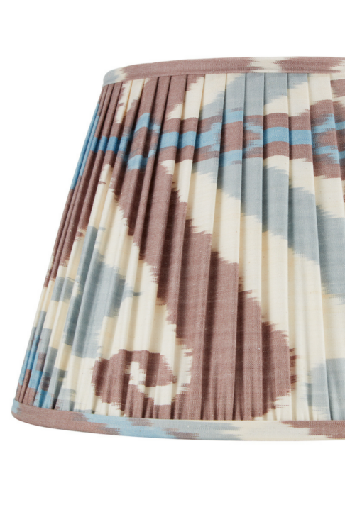 Warm brown silk Ikat lampshades with soft blue accents..