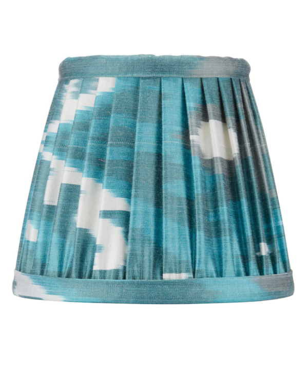 Teal Ikat silk candle shades.