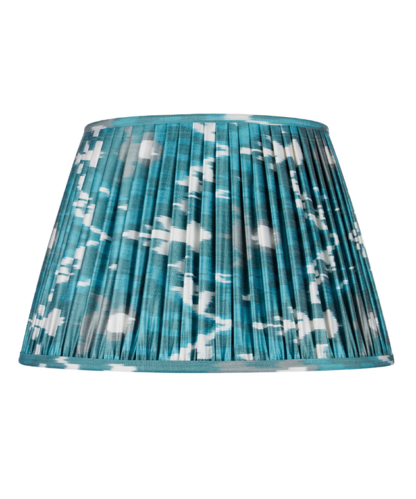 Teal silk Ikat lampshades with gathered fabric detailing.