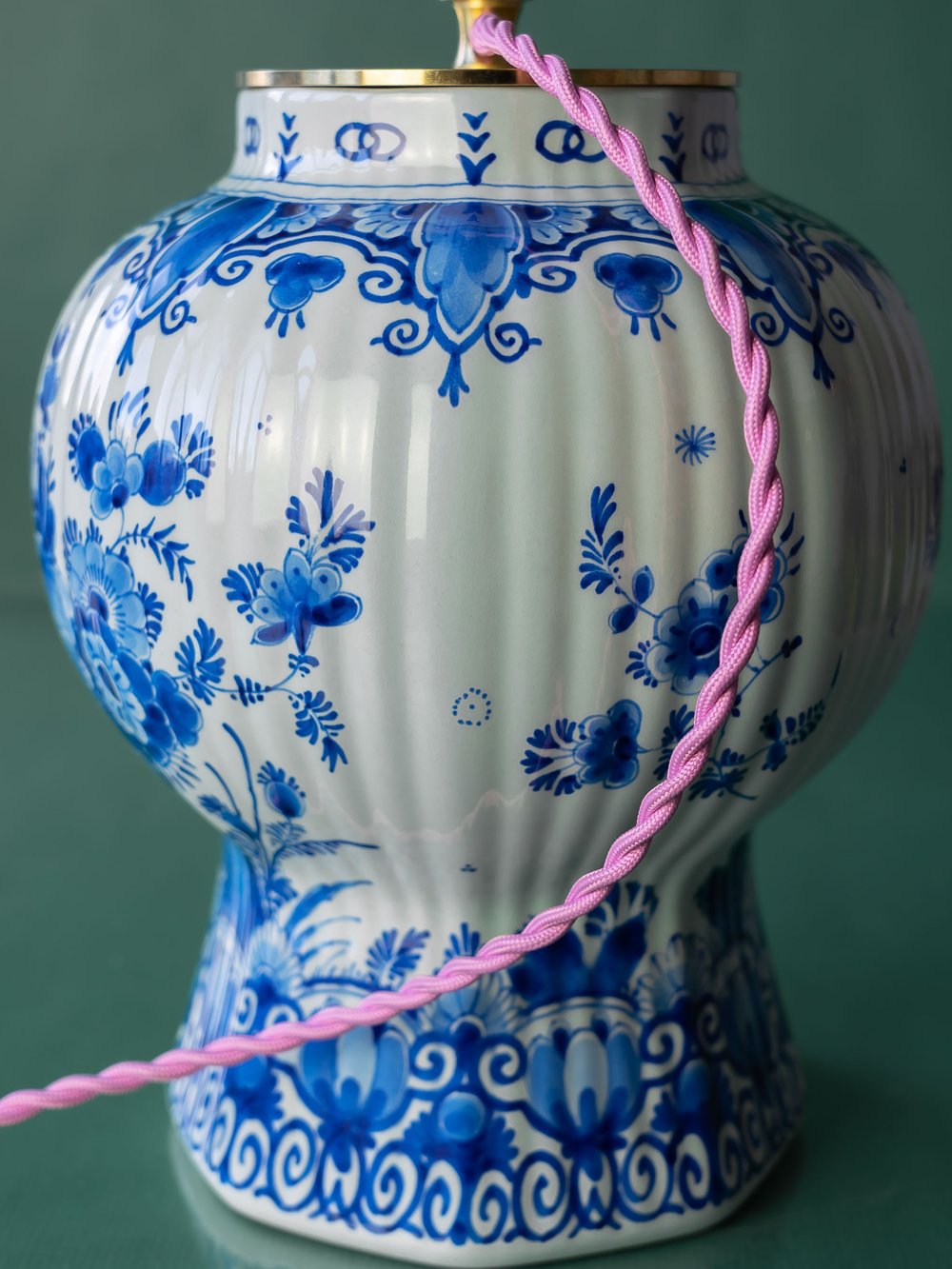 A Dutch Royal Delft lamp base with pink cord flex from Amitābha Studio.